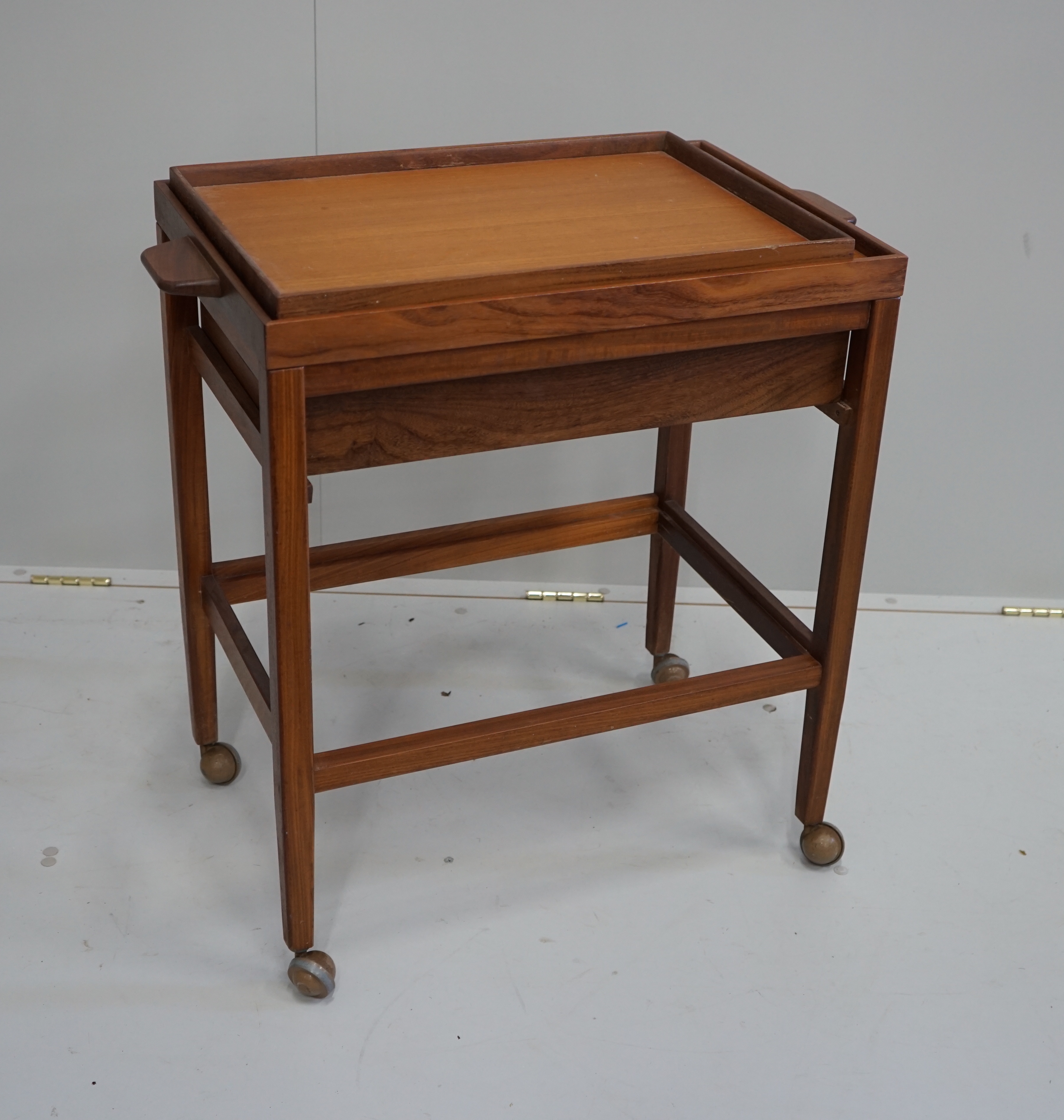 A mid century teak two tier trolley, width 70cm, depth 41cm, height 71cm